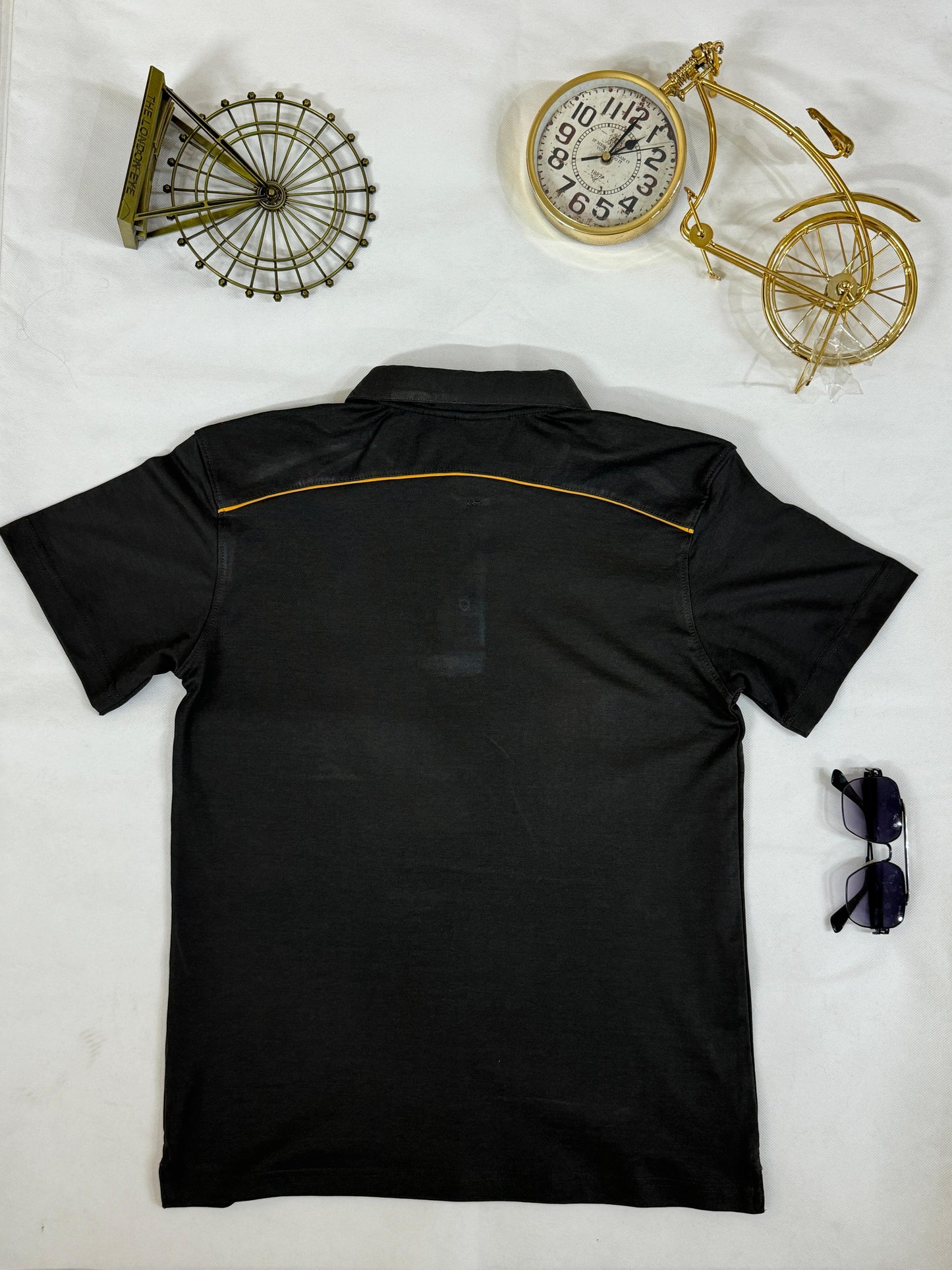 Men’s Black Polo with Yellow Piping – Sleek, Sporty, and Sharp